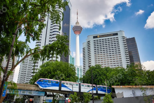Preview: Kuala Lumpur, Malaysia city scape. KL Tower view from the city downtown and Rapid KL monorail