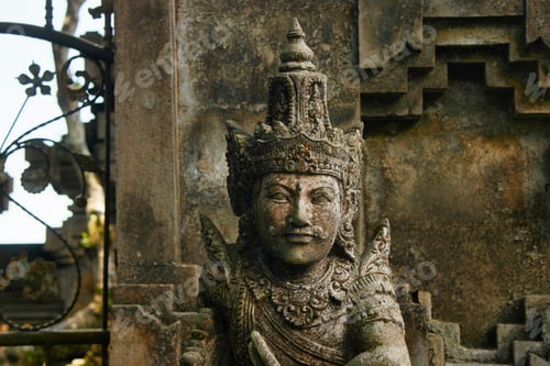 Preview: Ancient temple statue in Bali carved of stone showcasing local culture and craftsmanship