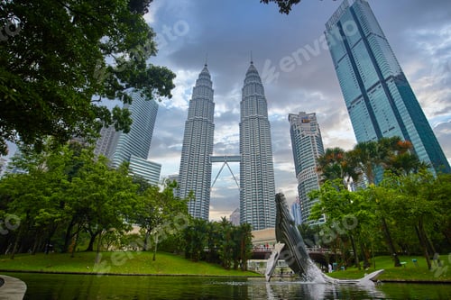 Preview: Green city public park by Petronas skyscrapers. The world's tallest Twin Towers in Kuala Lumpur
