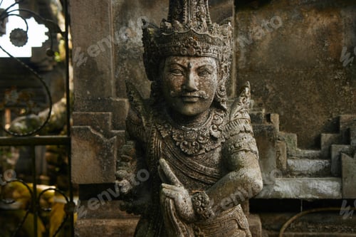 Preview: Ancient temple statue in Bali carved of stone showcasing local culture and craftsmanship