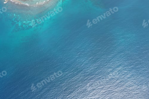 Preview: Aerial Top-Down View of Deep Blue Ocean and Turquoise Reef in Sumatra