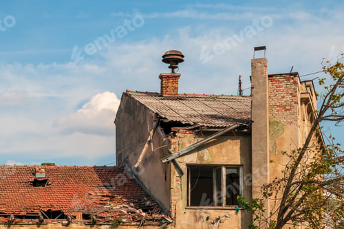 Preview: Old ruin, devastated house with asbestos roof tile ready to be rundown