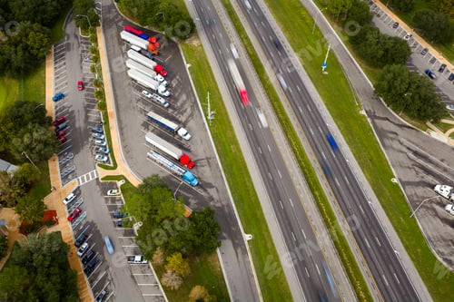 Preview: Parking rest area for cargo tractor-trailers near American interstate