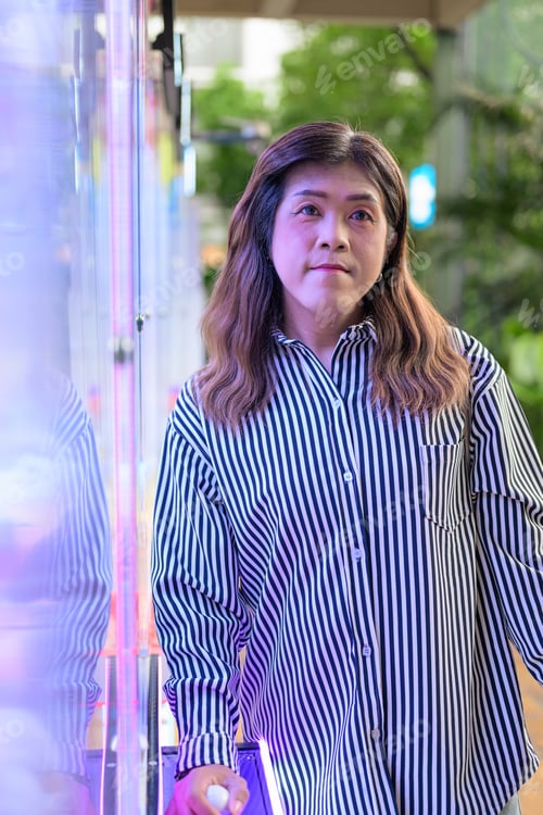 Preview: Thai Isan transgender businesswoman vertical arcade portrait