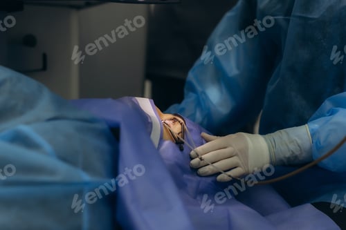 Preview: Surgeon performing laser eye surgery on patient for vision correction