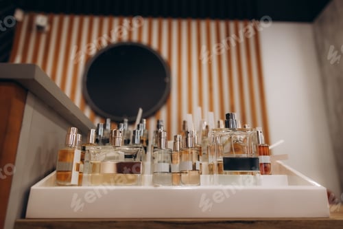 Preview: Perfume bottles on display in retail store