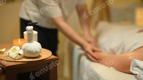 Preview: Spa essentials arranged on a wooden tray including aromatherapy candle