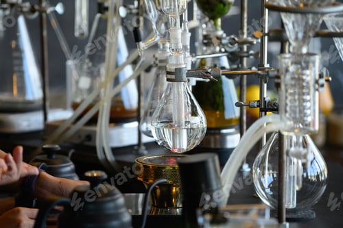 Preview: Laboratory Distillation Setup with Glass Flask and Heating Element in Scientific Research Environmen