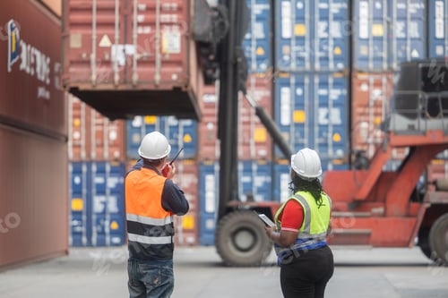 Preview: Workers coordinating container handling at port