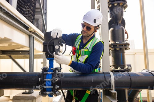 Preview: Industrial Technician Repairing Pipeline Valve System