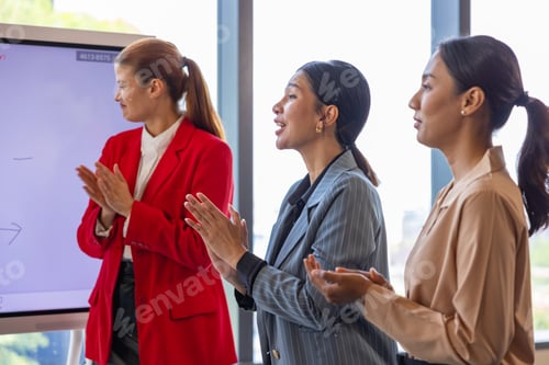 Preview: Businesswoman Presenting Strategy to Corporate Team