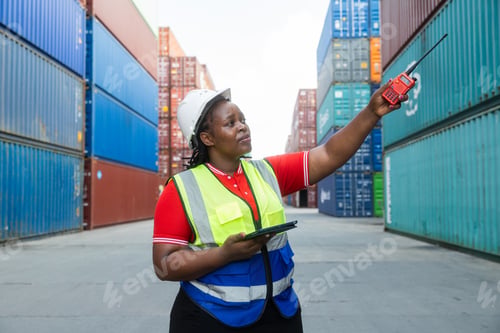 Preview: Female logistics worker communicating at container yard