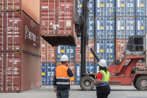 Preview: Workers coordinating container handling at port