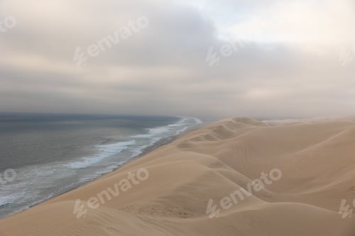 Preview: Namib Desert sand dunes meeting Atlantic Ocean shore