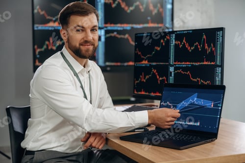 Preview: Bunch of screens with data. Handsome businessman is in the office with stock exchange market informa