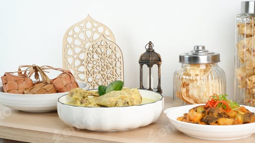 Preview: Opor Ayam, served with ketupat, sambal goreng ati and emping. Popular during Eid al Fitr. Indonesian