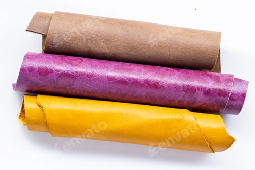 Preview: Three Rolled Leather Pieces in Brown Purple and Yellow on White Background, Colorful Genuine Materia