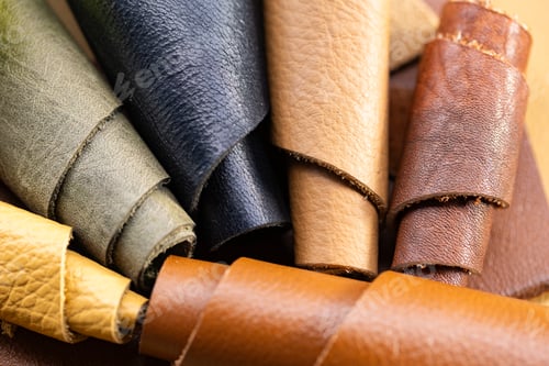 Preview: Collection of Colorful Rolled Leather Pieces in Multiple Earth Tones, Leather Craft Material Variety