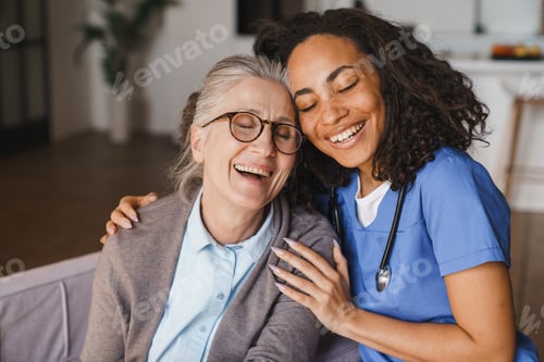 Preview: Headshot portrait of female nurse and senior woman at home, healthcare support, compassion