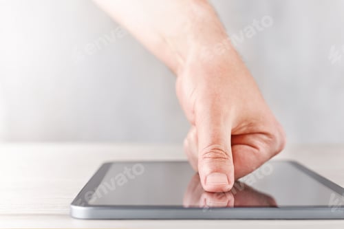 Preview: Hand touching tablet screen for digital trust and data privacy. Modern technology visual for adverti