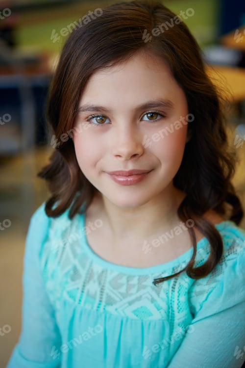 Preview: Child, girl and smile with portrait in classroom for learning, knowledge and academic development