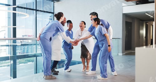 Preview: Excited, nurses and doctors with handstack in hospital for celebration, surgery success and victory