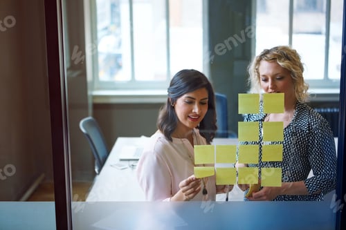 Preview: Women, sticky note or glass wall in office for timeline, business development or campaign planning