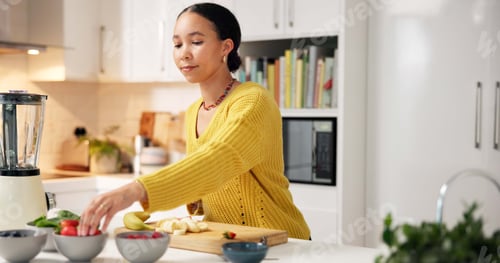 Preview: Woman, nutrition or bowl with fruit in kitchen for organic meal prep, smoothie or blender in home