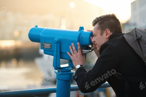 Preview: Man, tourist and telescope with view for sightseeing, travel or outdoor scenery in city