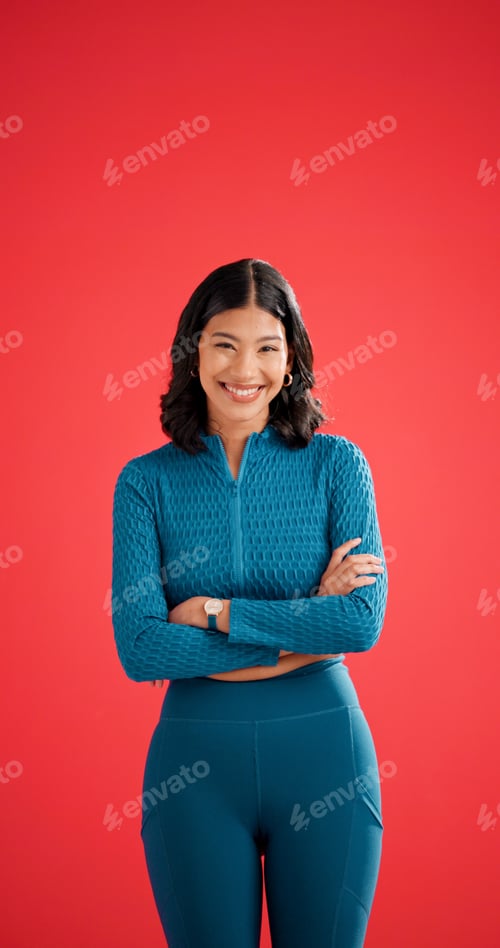 Preview: Happy, athlete and woman with arms crossed in studio, portrait or confident for fitness