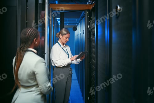 Preview: Tablet, women and inspection in server room for database, system performance or update