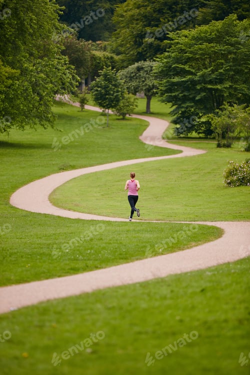 Preview: Running, back and woman with fitness, path and challenge with endurance, sprint or grass field