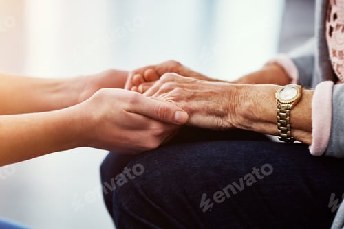 Preview: Nurse, senior patient and holding hands in house with support, trust and assisted living services