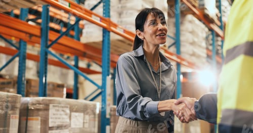 Preview: Happy woman, warehouse and logistics with handshake for partnership, b2b or shipping service