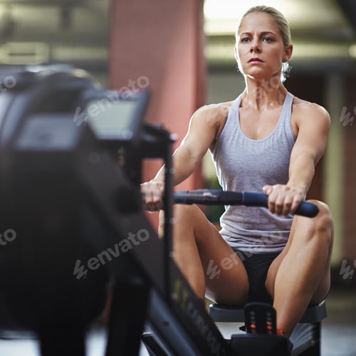 Preview: Gym, woman and rowing machine for workout, body health and wellness with fitness