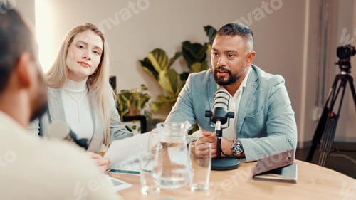 Preview: Podcast, microphone and group of people in studio for financial talk show, radio or live streaming
