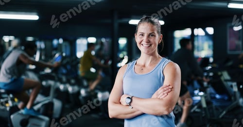 Preview: Portrait, personal trainer and woman with arms crossed, gym and confident for fitness in spin class