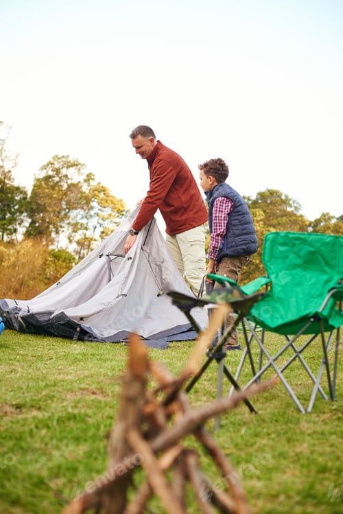 Preview: Dad, boy and building tent for camping, outdoor and happy with space, sky or teaching in nature