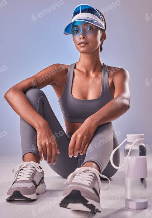 Preview: Portrait, exercise and woman with water bottle in studio for hydration, electrolytes and sports