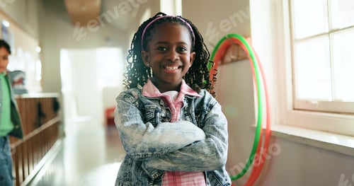 Preview: Child, portrait and happy in hallway for education, learning opportunity or back to school
