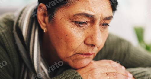 Preview: Thinking, sad and mature woman at house with vision, mental health crisis or remember memory