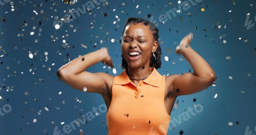Preview: Excited, confetti and black woman in studio, celebration and announcement on blue background