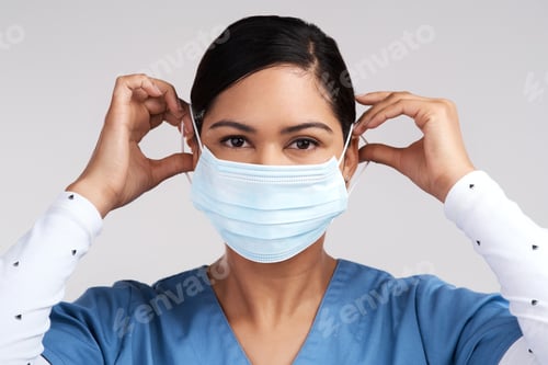 Preview: Portrait, nurse and woman with face mask for safety, healthcare and virus protection in studio