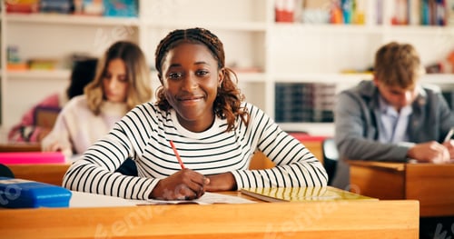 Preview: Happy, writing and portrait of girl teenager in classroom for learning, education or development