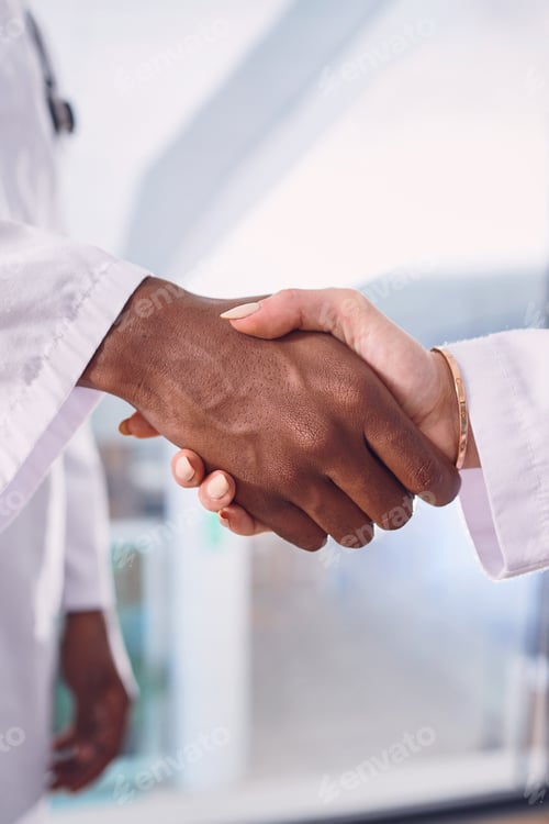 Preview: Handshake, hospital and hands of doctors for partnership, onboarding and agreement for treatment
