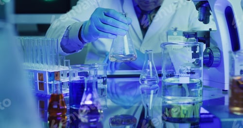Preview: Scientist, person and chemical beaker with sample for chemistry, experiment and medical research
