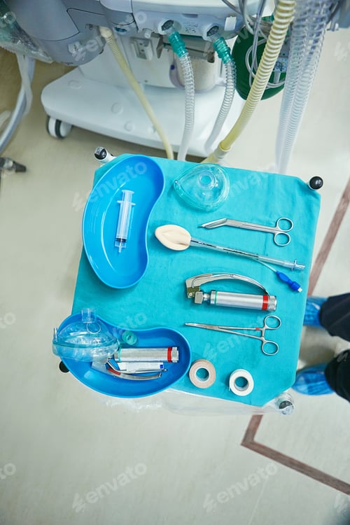 Preview: Above, table and equipment in medical theater for surgical preparation, surgery and critical care