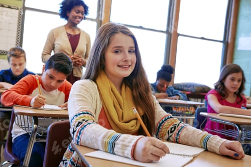 Preview: Portrait, happy girl and learning in classroom with notebook for knowledge, education or assignment