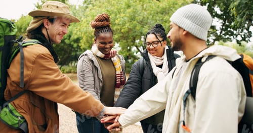 Preview: Hiking, hands stack and people in forest, support and bonding together for reunion