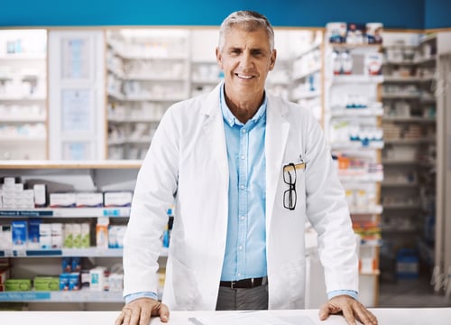 Preview: Chemist, portrait and man with smile, pharmacy and pride for career growth, healthcare and medicine